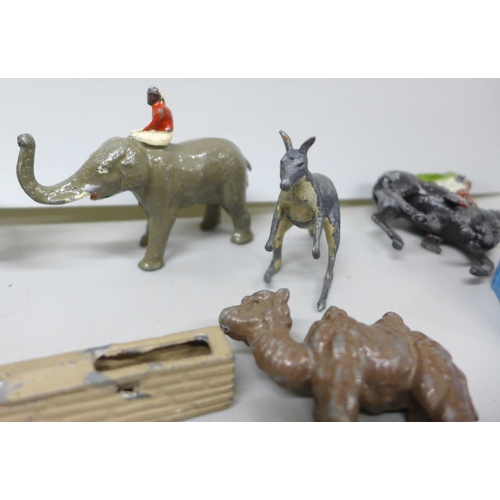 2106 - Snow White and the seven Dwarfs painted lead figures, a collection of painted lead farm and zoo anim... 