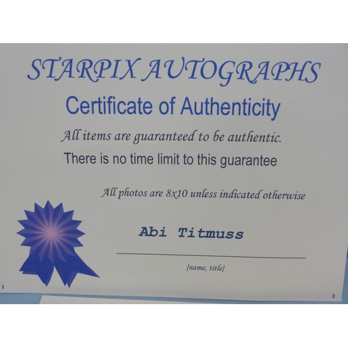 2050 - A collection of signed glamour photographs including Jennifer Ellison, Abi Titmus, Carmen Electra, e... 
