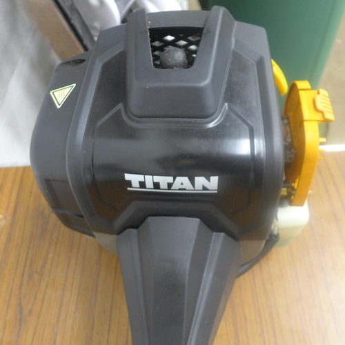 5195 - A Titan Anti-vibration petrol driven grass trimmer *Police Repossession
