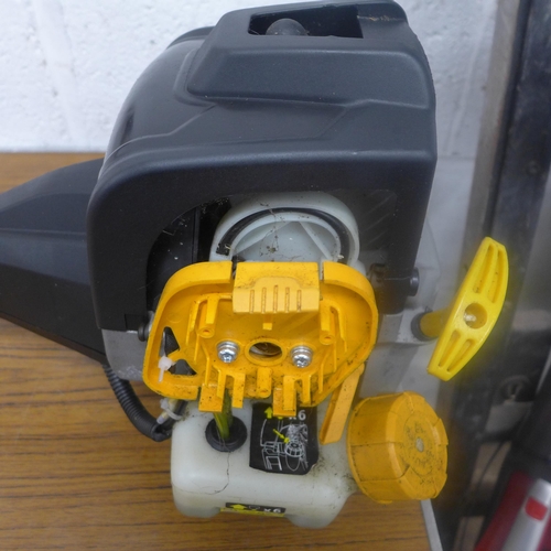 5195 - A Titan Anti-vibration petrol driven grass trimmer *Police Repossession