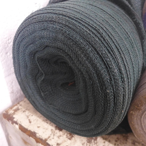 5196 - A large roll of green net, roll of blue wrap and roll of grey weed membrane