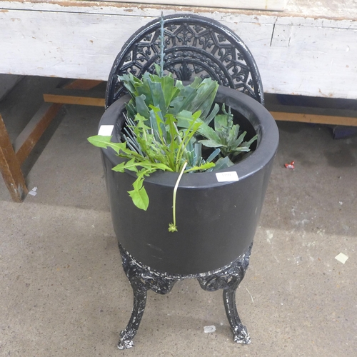 5199 - A painted metal garden chair and circular plastic plant pot with plant