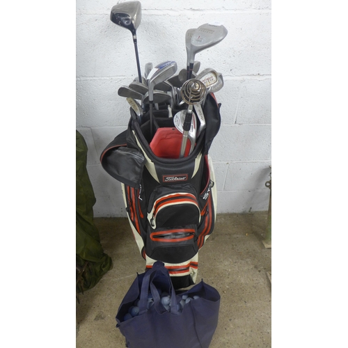 5207 - A Titleist golf bag, a quantity of assorted clubs including Fazer, Top-Flite, Adams, etc., and a bag... 