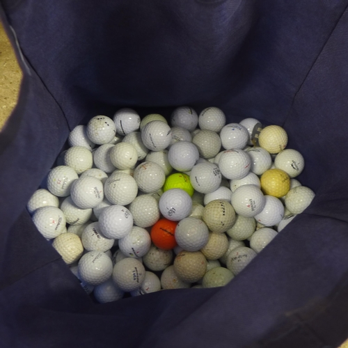 5207 - A Titleist golf bag, a quantity of assorted clubs including Fazer, Top-Flite, Adams, etc., and a bag... 