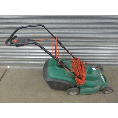 5218 - A quantity of garden tools including a Qualcast Power-Trak 400 electric lawn mower, branch lopper, s... 