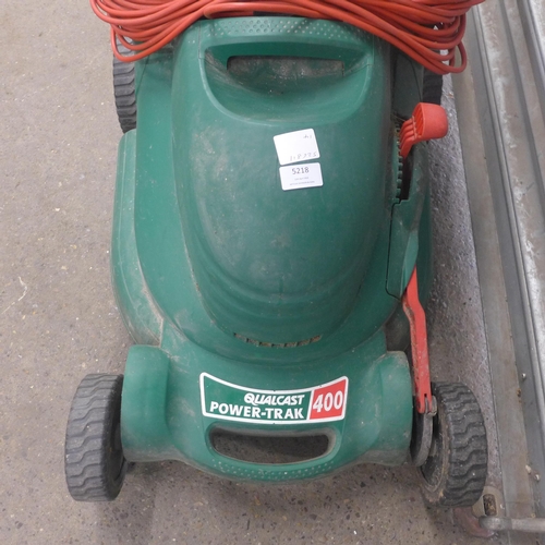 5218 - A quantity of garden tools including a Qualcast Power-Trak 400 electric lawn mower, branch lopper, s... 