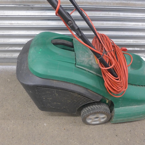 5218 - A quantity of garden tools including a Qualcast Power-Trak 400 electric lawn mower, branch lopper, s... 