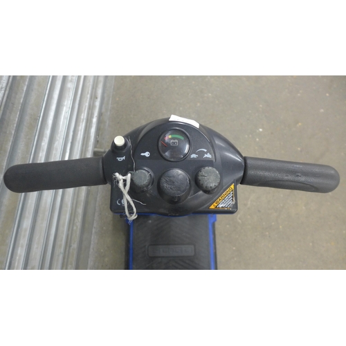 5219 - A Pride Mobility Go-Go compact mobility scooter with key and charger