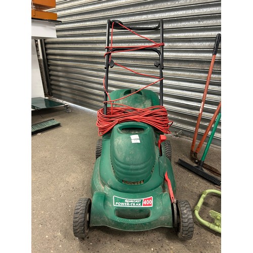 5218 - A quantity of garden tools including a Qualcast Power-Trak 400 electric lawn mower, branch lopper, s... 