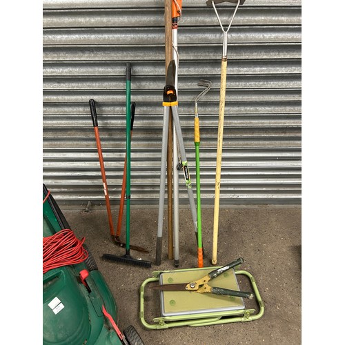 5218 - A quantity of garden tools including a Qualcast Power-Trak 400 electric lawn mower, branch lopper, s... 