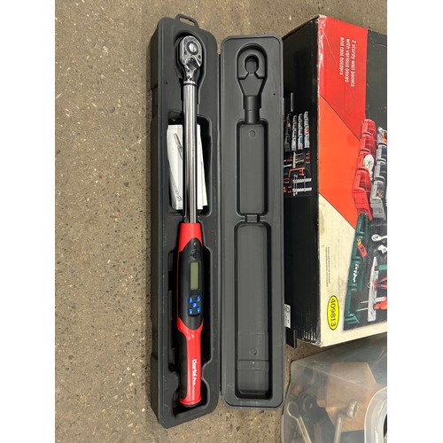 5234 - 2 boxes of tools including axes, saw, large socket in a case, bolts and a Parkside organiser and sto... 