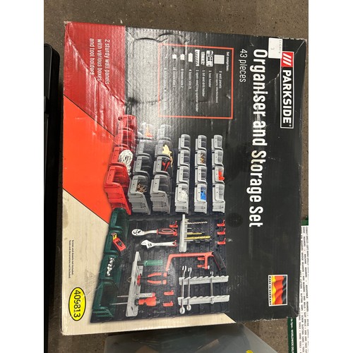 5234 - 2 boxes of tools including axes, saw, large socket in a case, bolts and a Parkside organiser and sto... 