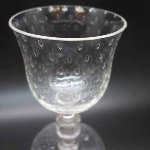 2033 - A stemmed glass with controlled bubble detail, 15cm