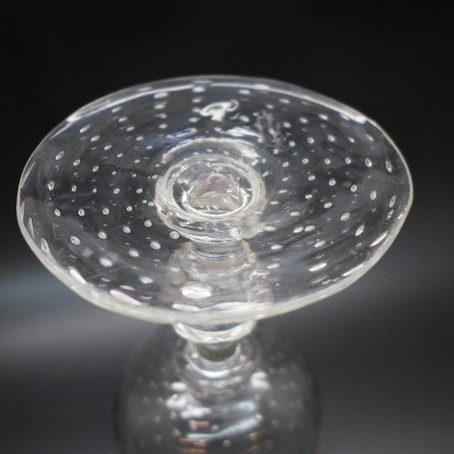 2033 - A stemmed glass with controlled bubble detail, 15cm