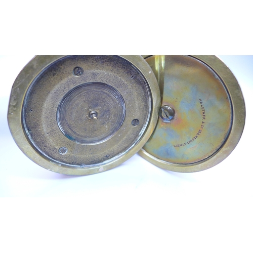 2069 - A pair of Victorian Gothic Revival brass open-twist candlesticks, each set with three cabochon malac... 