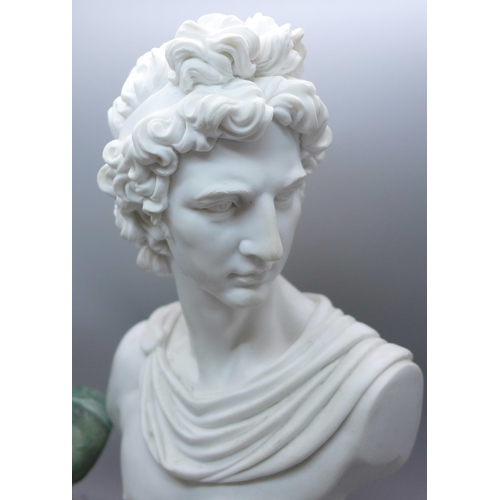 2079 - A Greek style bronze effect bust, 18cms h and a Roman style bust