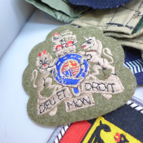 2094 - A quantity of military cloth badges