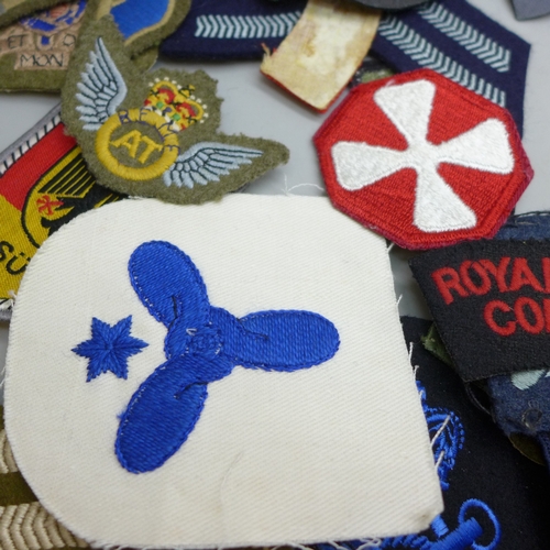 2094 - A quantity of military cloth badges