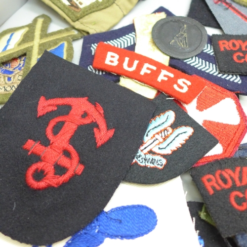 2094 - A quantity of military cloth badges