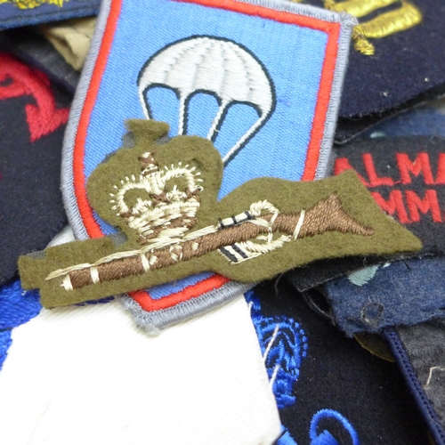 2094 - A quantity of military cloth badges