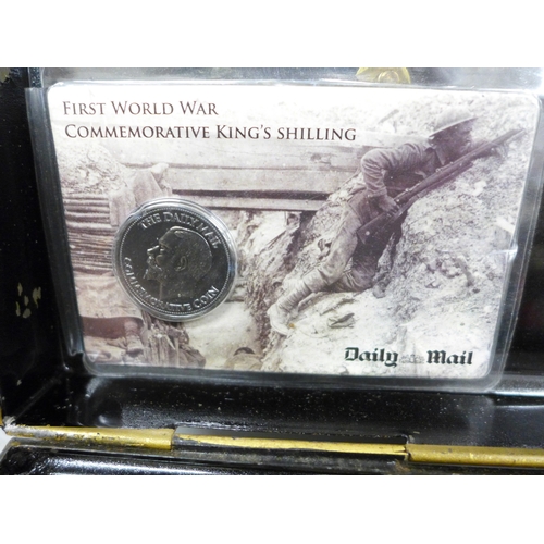 2111 - A tin money box, containing various coins and bank notes