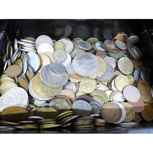 2111 - A tin money box, containing various coins and bank notes