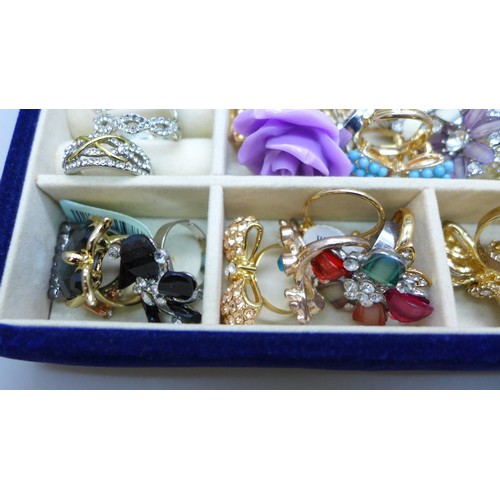 2078 - A box of costume jewellery, mostly rings