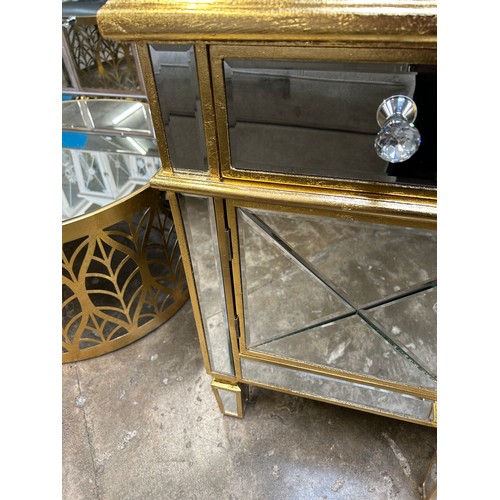 3005 - A gold mirrored media unit
