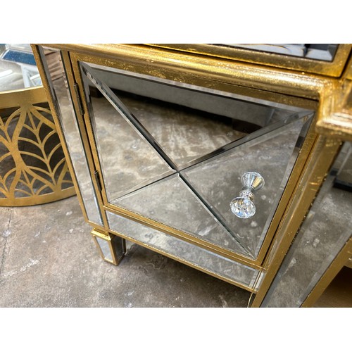 3005 - A gold mirrored media unit