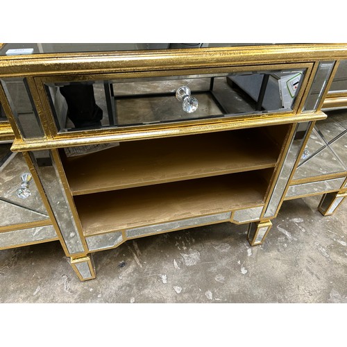 3005 - A gold mirrored media unit