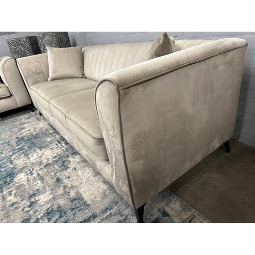 3031 - A taupe velvet upholstered 3 seater sofa