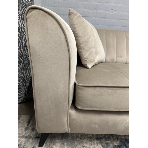 3031 - A taupe velvet upholstered 3 seater sofa