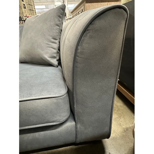 3037 - A dark grey velvet upholstered 2 seater sofa