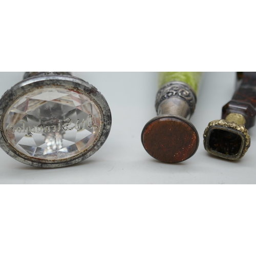 2109 - Three wax seals including a faceted glass example and hardstone example with silver hallmark (marks ... 