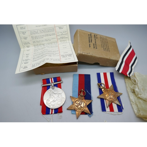 2118 - A WWII medal with ribbons, boxed