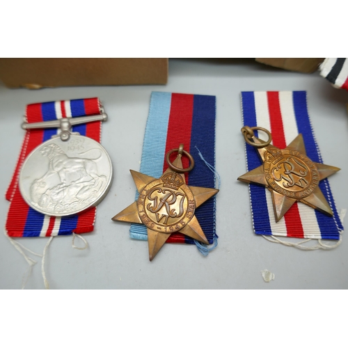 2118 - A WWII medal with ribbons, boxed