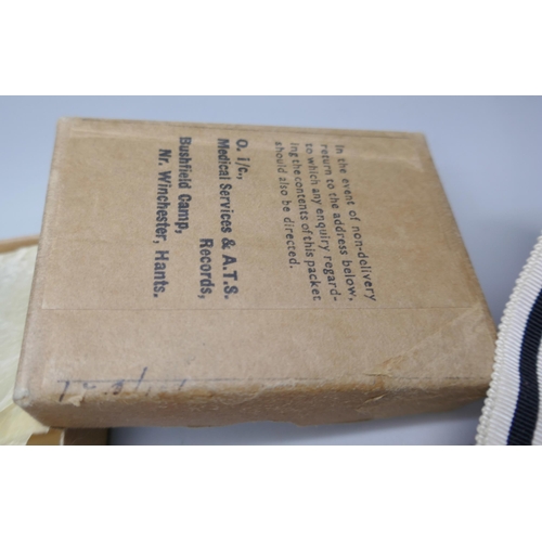 2118 - A WWII medal with ribbons, boxed