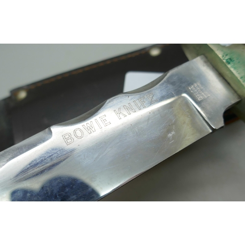 2132 - A Bowie knife and sheath **PLEASE NOTE THIS LOT IS NOT AVAILABLE FOR PACKING AND POSTING**