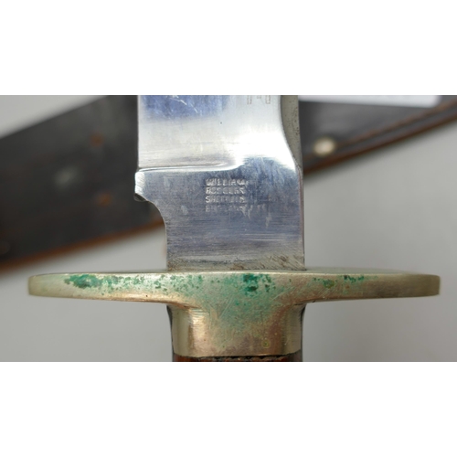 2132 - A Bowie knife and sheath **PLEASE NOTE THIS LOT IS NOT AVAILABLE FOR PACKING AND POSTING**