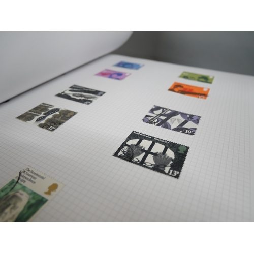 2158 - A large collection of 20th Century stamps including four albums and loose. Together with Stanley Gib... 