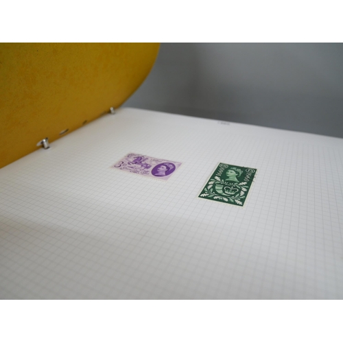 2158 - A large collection of 20th Century stamps including four albums and loose. Together with Stanley Gib... 