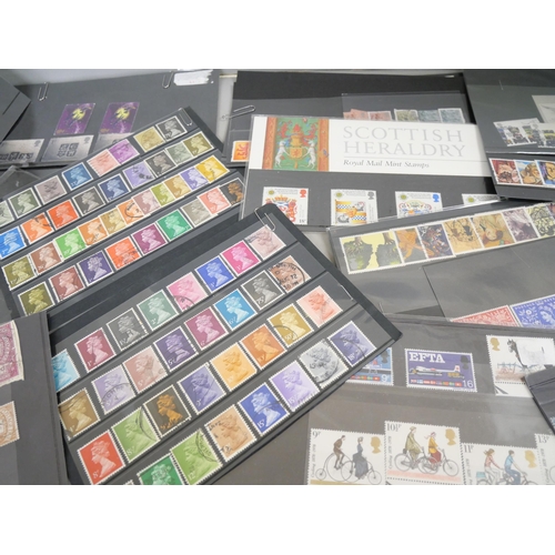 2158 - A large collection of 20th Century stamps including four albums and loose. Together with Stanley Gib... 