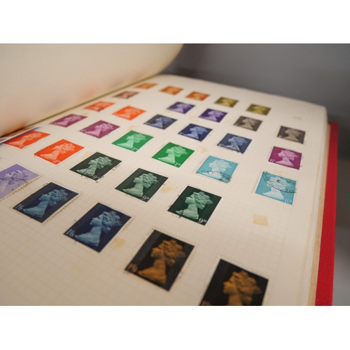 2158 - A large collection of 20th Century stamps including four albums and loose. Together with Stanley Gib... 