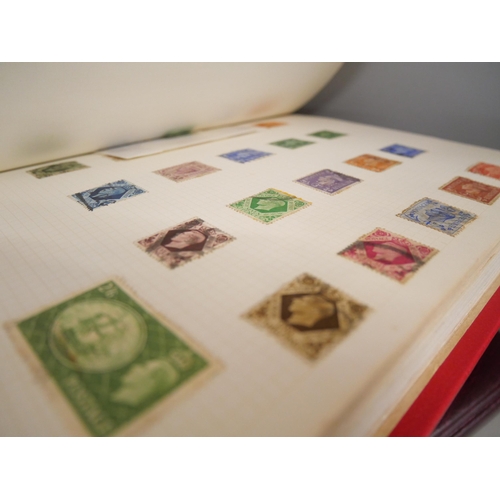 2158 - A large collection of 20th Century stamps including four albums and loose. Together with Stanley Gib... 