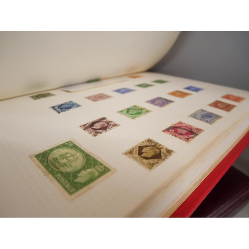 2158 - A large collection of 20th Century stamps including four albums and loose. Together with Stanley Gib... 