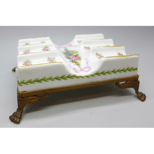2034M - An 18th Century French Sevres porcelain and ormolu mounted pen stand, circa 1768, 4.5cms h x 13cms w