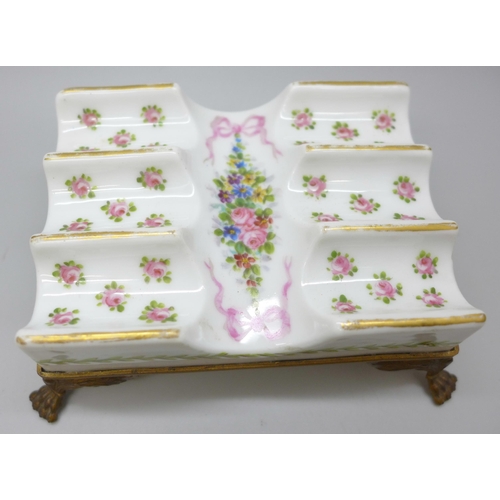 2034M - An 18th Century French Sevres porcelain and ormolu mounted pen stand, circa 1768, 4.5cms h x 13cms w