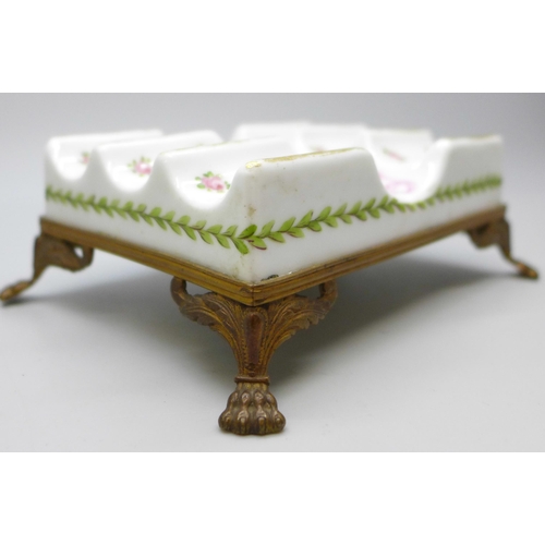 2034M - An 18th Century French Sevres porcelain and ormolu mounted pen stand, circa 1768, 4.5cms h x 13cms w