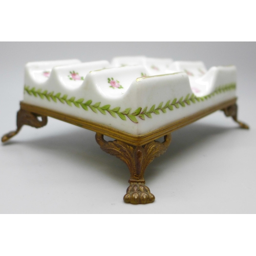 2034M - An 18th Century French Sevres porcelain and ormolu mounted pen stand, circa 1768, 4.5cms h x 13cms w