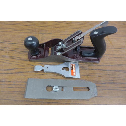 5006 - A Stanley Handyman wood plane in original box, a Stanley saw, a Workzone 3/8